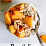 Peach pie overnight oats in small white bowl with diced fresh peaches, slivered almonds, and a dusting of cinnamon